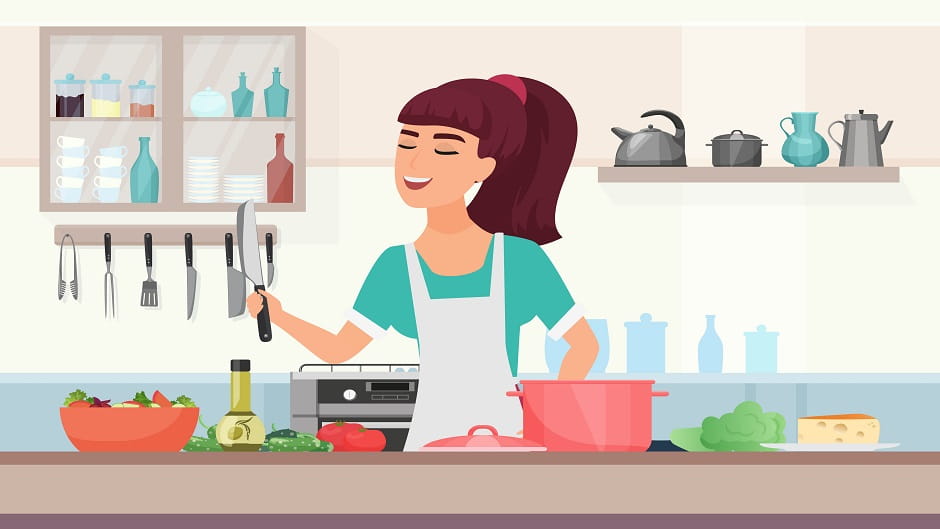 Kvinde der laver mad i køkken